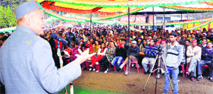 CM Virbhadra Singh address an election rally in Manali on Friday. 