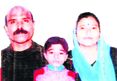 Lakhveer Singh with his wife and daughter