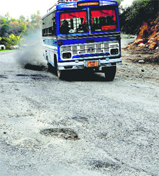 A damaged stretch of the Kangra-Dharamsala road.