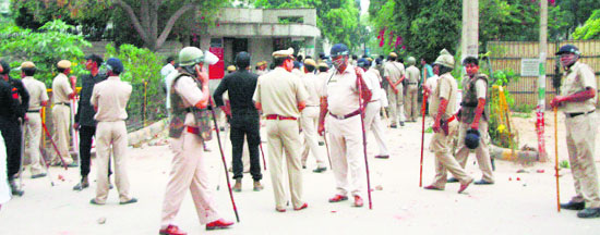 Police force deployed outside Orient Craft in Gurgaon on Friday.