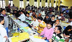 Election Commission staff dispatch postal votes for upcoming parliamentary elections in Jammu