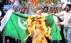 Workers of the Dogra Front burn Pakistan flag in Jammu on Friday