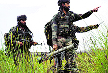 Army men cordon off the encounter area at Janglote in Kathua on Friday