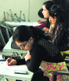 Students take part in a sketching competition on the second day of the North Zone Inter-Medical & Dental College Tournament in Ludhiana.