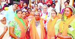 Congress candidate Ambika Soni with her supporters in Morinda on Friday. A Tribune photograph