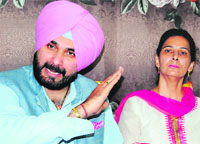 Amritsar MP Navjot Sidhu and his wife Navjot Kaur. file photo