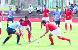 Indian Air Force and BSF players in action during their semifinal match of the Dashmesh hockey tournament.