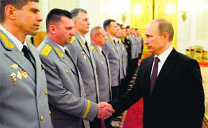 Russian President Vladimir Putin at the presentation ceremony of the top military brass in the Kremlin in Moscow on Friday.
