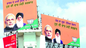 Display boards and hoardings are installed at various intersections in Amritsar.