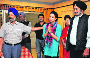 AAP candidate Gul Panag gets emotional while seeking support from members of the Veteran Sikh Regiment Officers Association at the DSOI, Chandigarh, on Saturday.