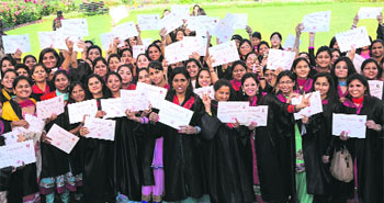Students of the Dev Samaj College of Education, Sector 36-B, Chandigarh, in a jubilant mood after receiving degrees during a convocation on Saturday.