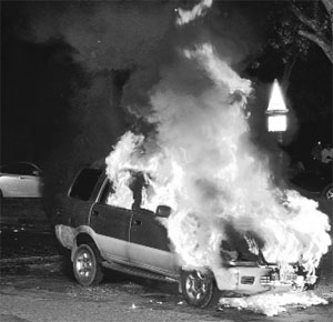 A vehicle in flames at the Sectors 32/31, 29/30 light point in Chandigarh on Saturday.