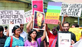 Activists from AISA, JNUSU, AIPWA, Right to Water Campaign and other groups hold a protest march from the Mandi House Metro station to Jantar Mantar against the Armed Forces Special Powers Act, in New Delhi on Sunday