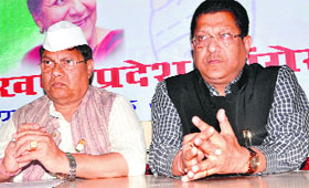 State Congress vice-president Suryakant Dhasmana (right) and spokesperson Dhirendra Pratap address mediapersons in Dehradun on Sunday.