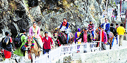 Devotees on their way to the Vaishno Devi shrine ahead of Navratras in Katra on Sunday