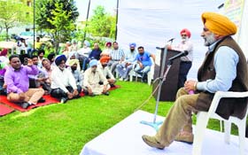 CPM candidate Sukhvinder Singh Sekhon addresses a public meeting in Ludhiana on Sunday.