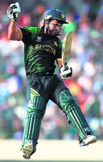 Ahmed Shehzad struck Pakistan's maiden T20 ton to keep teams semifinal hopes alive.