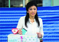 Thai Prime Minister Yingluck Shinawatra casts her ballot in the Senate elections in Bangkok on Sunday