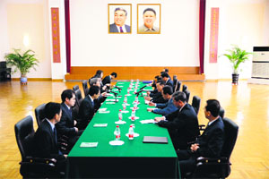 Japanese officials talk to North Koreas envoy at the North Korean embassy in Beijing on Sunday