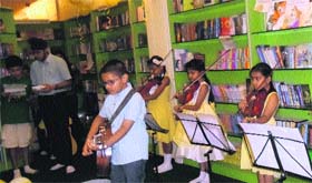 Children participate in a summer reading programme at One Up Library in Amritsar.