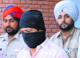 CIA staff with the accused detained with heroin in Amritsar on Monday. 