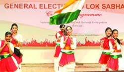 Folk dancers perform at a mega event at Mata Sundri College for Women under SVEEP activity regarding awareness programme for enhancement of high voter turnout in the forthcoming Lok Sabha Elections, in New Delhi on Monday