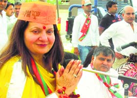 Kiran Chopra campaigns for her husband and BJP candidate Ashwini Chopra in Karnal on Monday