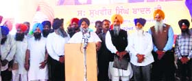 Deputy Chief Minister Sukhbir Singh Badal addresses a rally at Garhshankar in Hoshiarpur district on Monday.