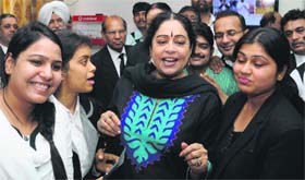 BJP candidate Kirron Kher campaigns at the Judicial Complex in Sector 43, Chandigarh, on Tuesday.