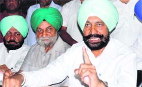Balbir Singh Sidhu, MLA, Mohali, addresses a press conference on Tuesday.