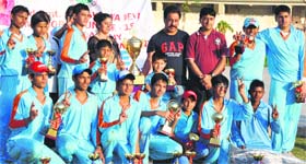 Players of the Hansraj Cricket Academy with the trophy in Panchkula.