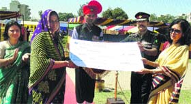 A war widow being honoured during the golden jubilee celebrations in Chandimandir.