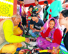 Devotees pray at a temple during Chaitra Navrataras in Almora on Tuesday