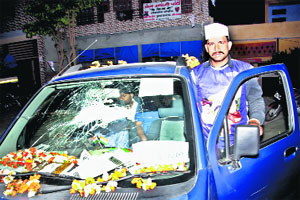 The Wagon-R car gifted by Arvind Kejriwal to AAP Rohtak nominee Naveen Jaihind was damaged by two youths on Monday evening.