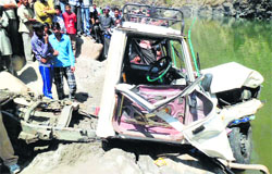 Mangled remains of the jeep that fell into the Beas at Pandoh in Mandi on Tuesday.