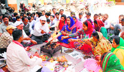 Students and staff perform a hawan at SDP Senior Secondary School, Hazuri Road, in Ludhiana. A Tribune photograph
