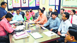 Civil Surgeon Dr Subhash Batta meets hotel owners in Ludhiana. Photo: Inderjeet Verma