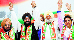 Laal Singh (extreme left), PPCC chief Partap Singh Bajwa, Bir Devinder Singh, who has joined the Congress, and Rajinder Kaur Bhattal at a press conference in Chandigarh on Tuesday