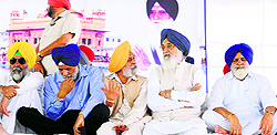 Chief Minister Parkash Singh Badal with Cabinet Minister Surjit Rakhra (second left) at late Gurcharan Tohras bhog ceremony in Patiala on Tuesday