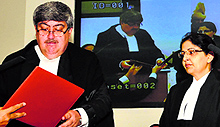 Sanjay Kishan Kaul, Chief Justice of the Punjab and Haryana High Court, administers oath to Lisa Gill in Chandigarh