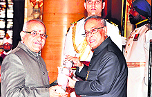 President Pranab Mukherjee awards Padam Shri to Guru Ravidas Ayurved University Vice-Chancellor OP Upadhyaya in New Delhi on Monday