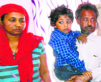 Three-year-old Nikhil wih his parents in Barnala on Tuesday