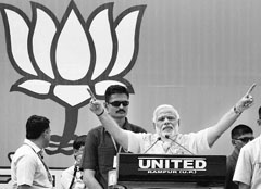 BJP's prime ministerial candidate Narendra Modi addresses an election rally in Bareilly on Tuesday. PTI