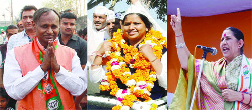 Candidates from the North West Delhi constituency (from left) Udit Raj of the BJP, Rakhi Birla of the AAP and Krishna Tirath of the Congress campaign on Tuesday