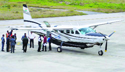 Kullu DC Rakesh Kanwar flags off the inaugural flight of a non-scheduled airliner between Kullu and Chandigarh at the Bhuntar airport on Wednesday. 