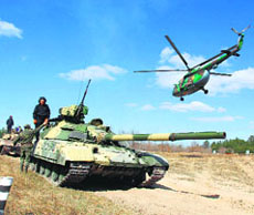 Ukrainian forces take part in military exercises on the firing range in Desna on Wednesday.