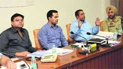 Officials during a meeting in Bathinda on Thursday. Tribune photo