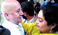 Kirron Kher, BJP candidate for the Chandigarh Lok Sabha seat, with her husband Anupam Kher at the Student Centre, PU, on Thursday