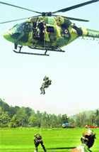 Army personnel during a mock drill Mountain Rescue at the Annandale ground in Shimla on Thursday. 