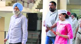 Aam Aadmi Party candidate HS Phoolka (left) at the Deputy Commissioners office in Ludhiana on Thursday.